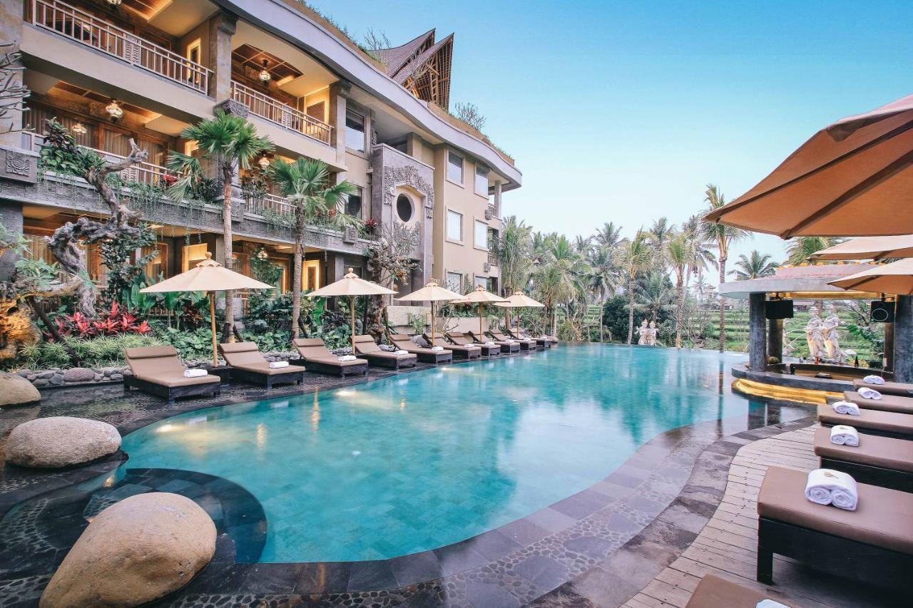 Kuwarasan A Pramana Experience Hotel Ubud Exterior foto The swimming pool at the hotel