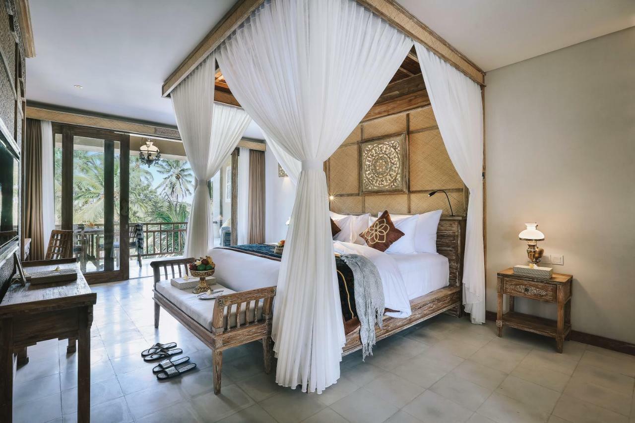Kuwarasan A Pramana Experience Hotel Ubud Exterior foto A bedroom at the resort
